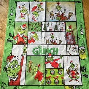 SOLD.   Brand new 30x40 inch Grinch blanket